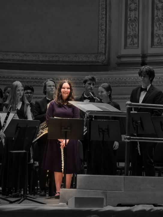 Maya performing flute at Carnegie Hall